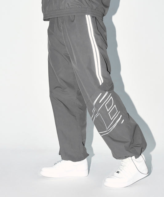 REFLECTIVE LINE BIG SYMBOL WIDE PANTS [CHARCOAL]
