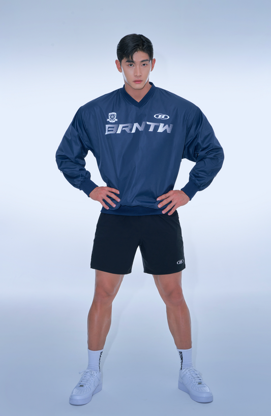 BRNTW WIND TECH WOVEN TOP [NAVY]