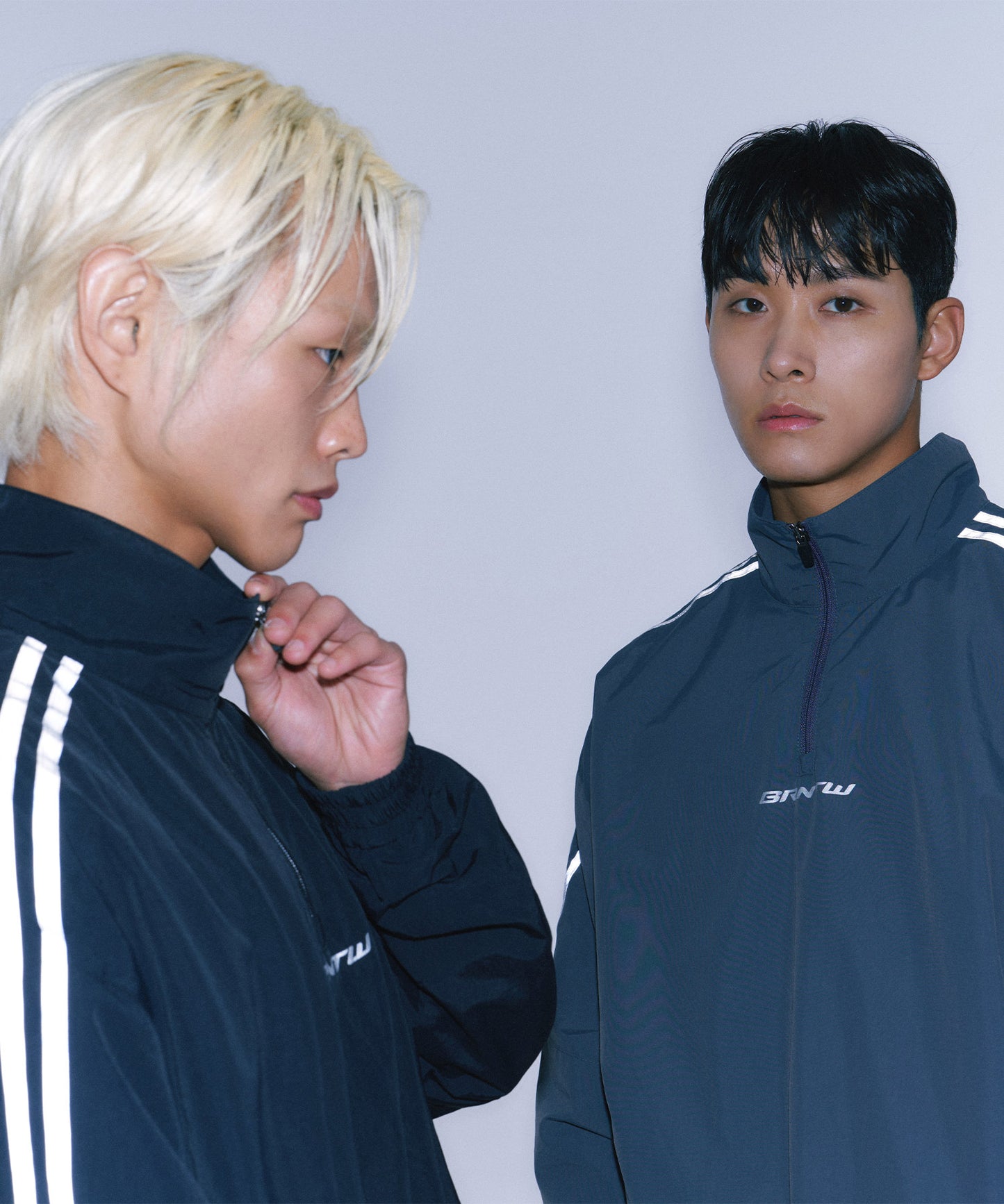 REFLECTIVE LINE BIG SYMBOL ANORAK JACKET [BLACK]