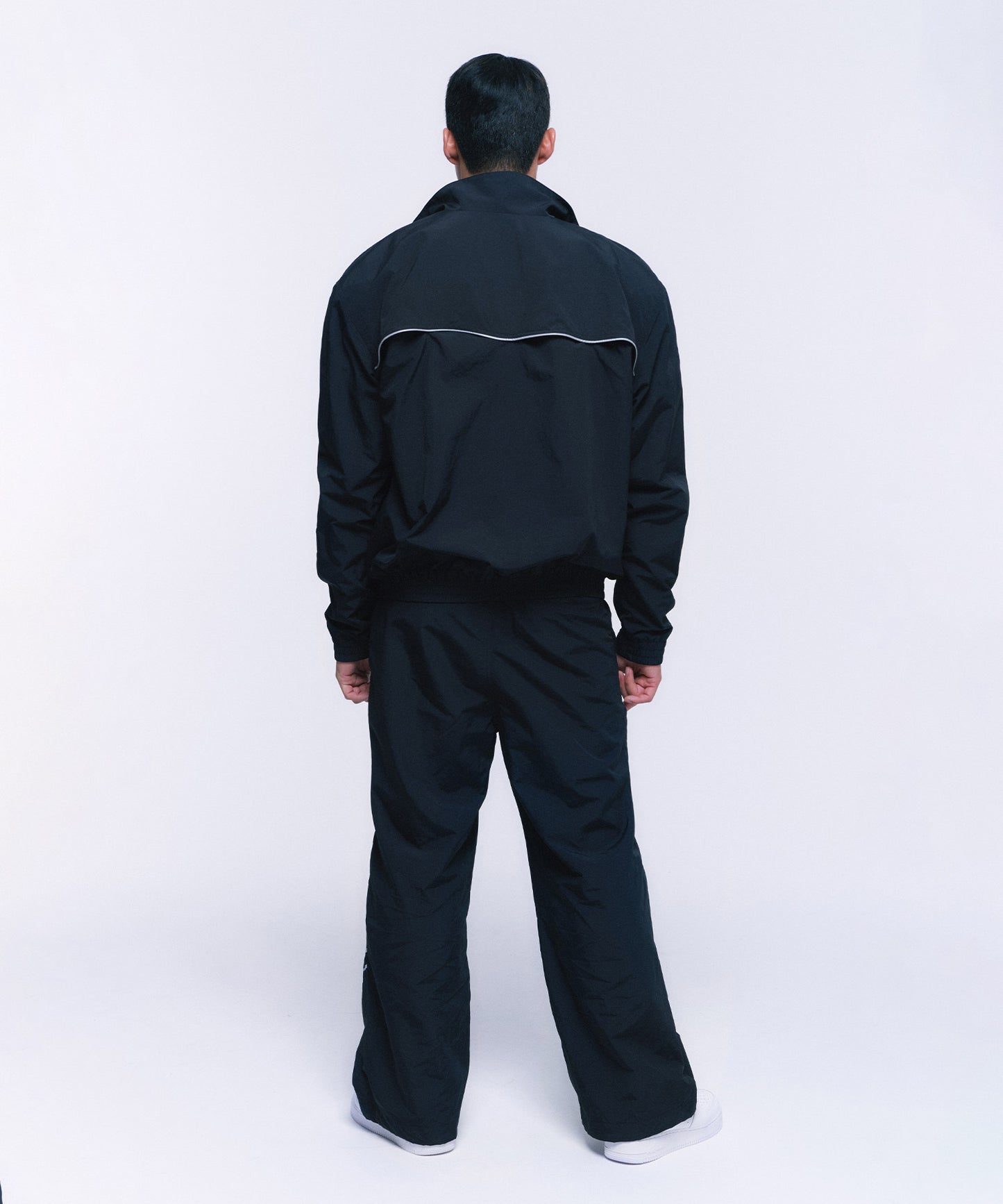 REFLECTIVE LINE BIG SYMBOL WIDE PANTS [BLACK]