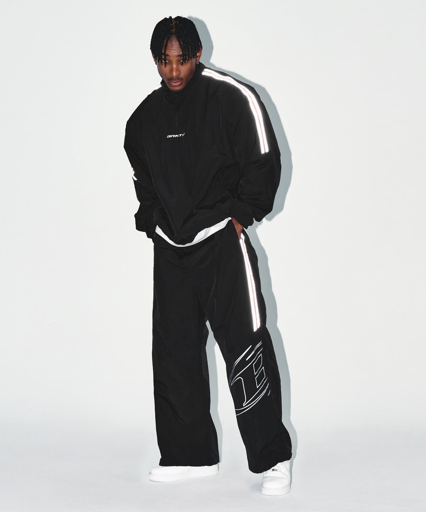 REFLECTIVE LINE BIG SYMBOL ANORAK JACKET [BLACK]